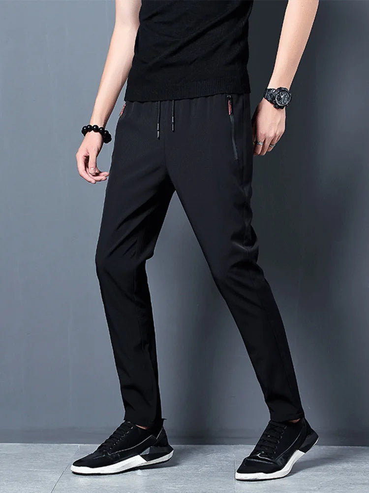 Summer men's ice silk quick drying casual pants slim fit Korean version ice silk pants sports pants straight tube quick drying