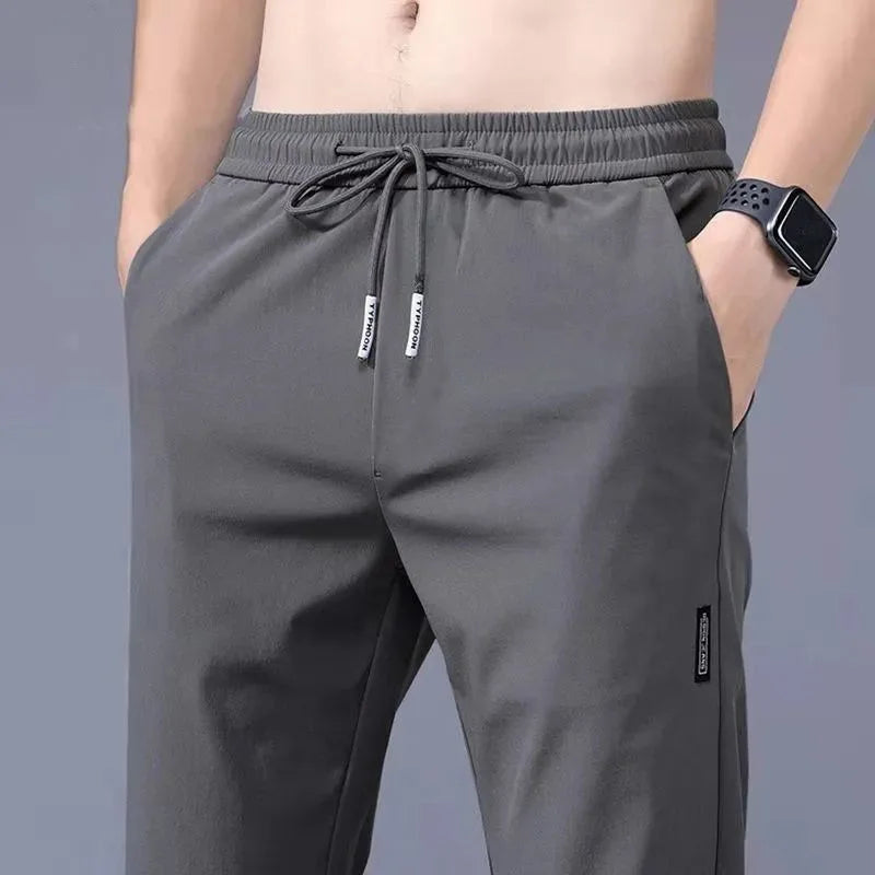 Men's Casual Pants Stretch Slim Fit Elastic Waist Jogger Korean Classic Blue Black Gray Male Brand Trousers Plus Size 4XL 5XL